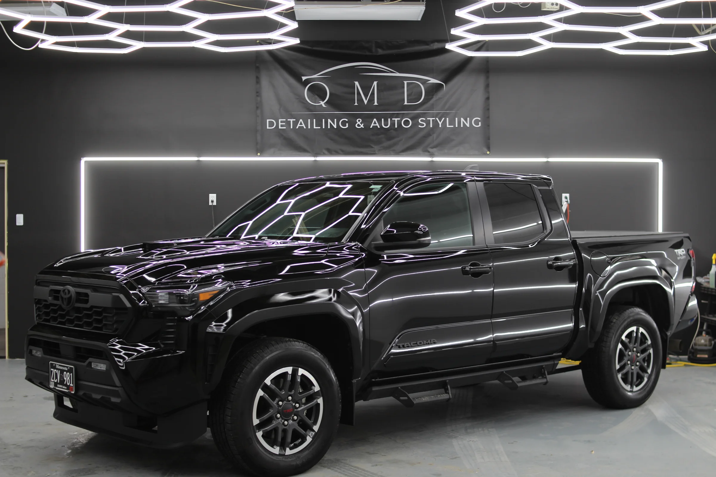 Black Toyota Tacoma TRD detailed at QMD studio