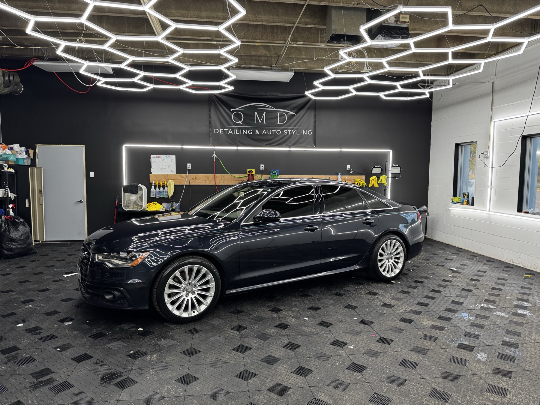 Dark blue Audi A6 in the QMD studio